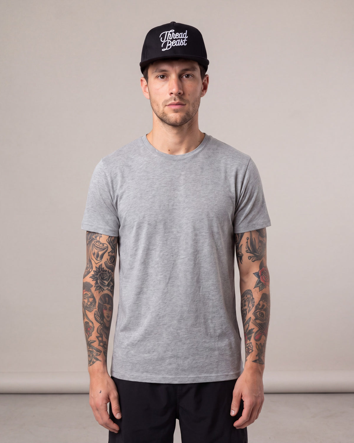 Threadbeast Logo Snapback hats — Black — model front