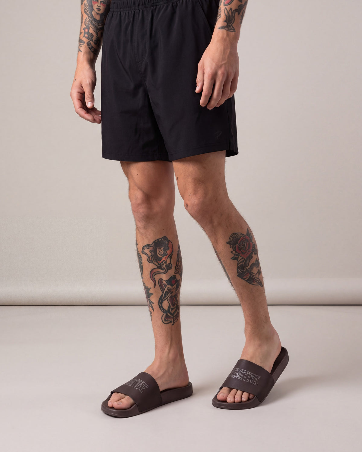Primitive Collegiate Slides — Brown — model angle
