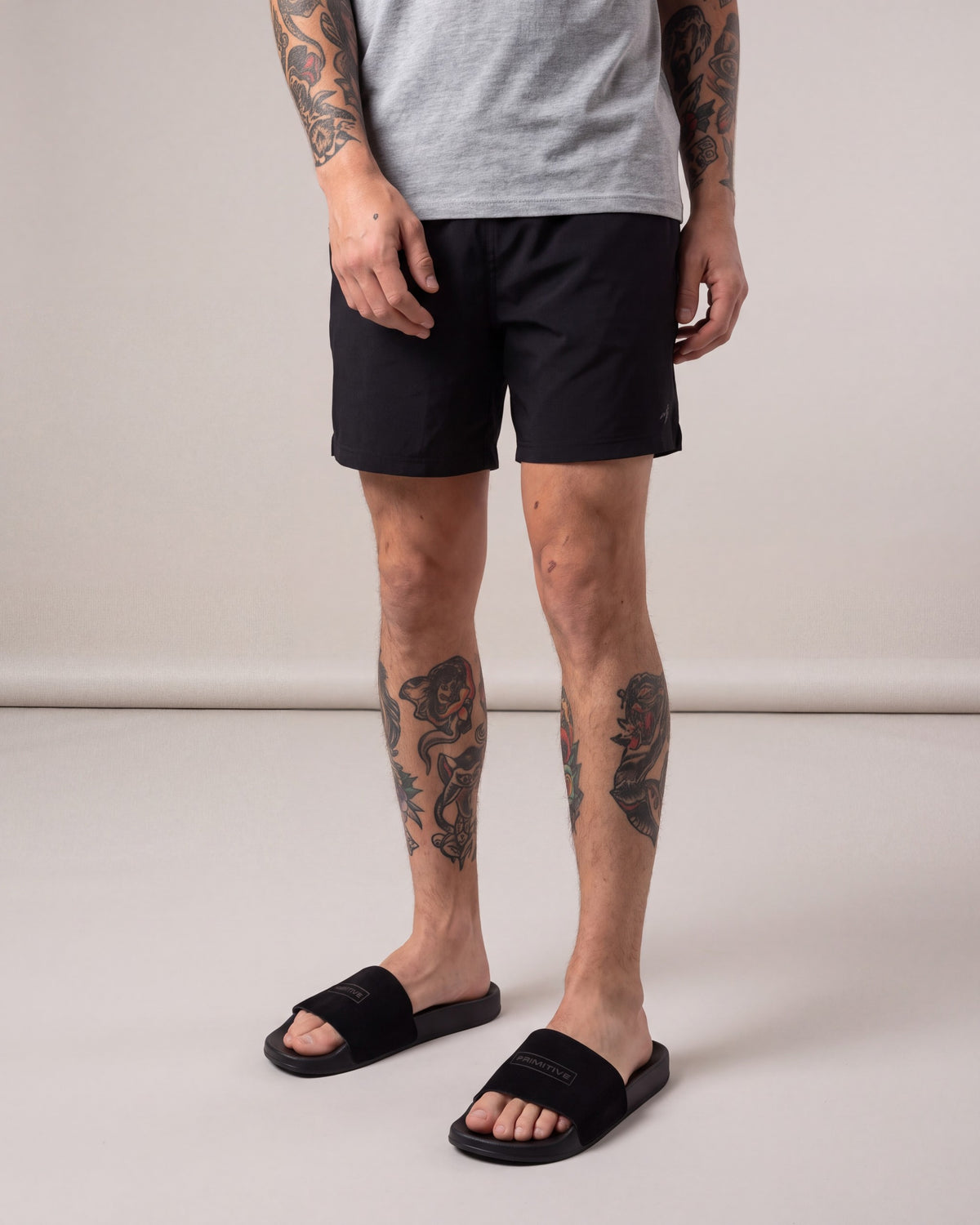 Primitive Suede Boxed Slides — Black — model angle