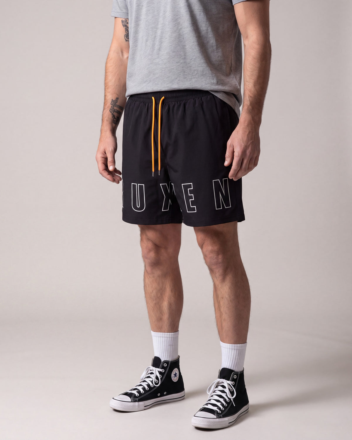 Ruxen Nylon Shorts — Black — model side