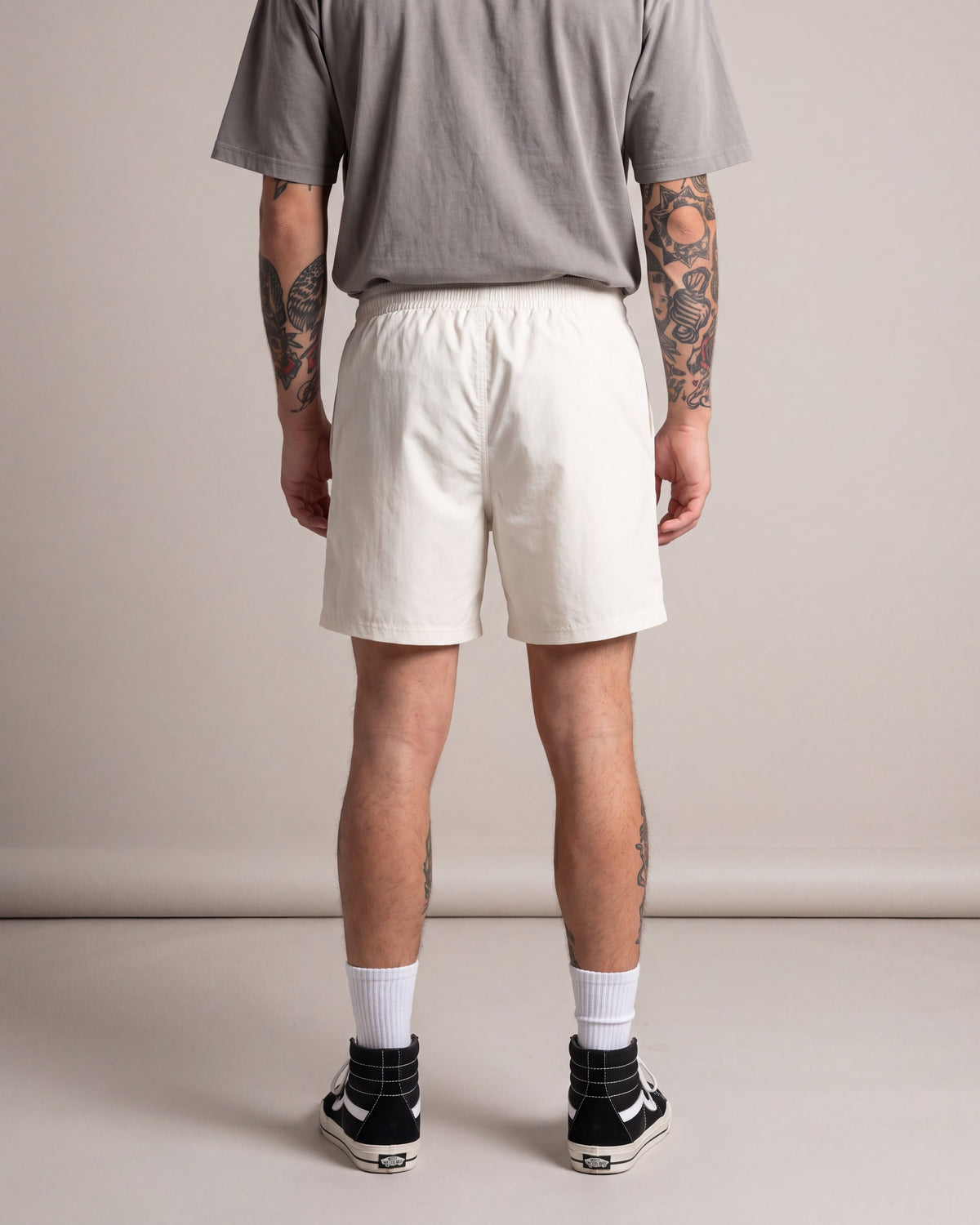 Ruxen Nylon Shorts — Off White — model back