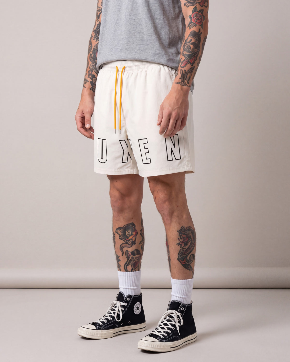 Ruxen Nylon Shorts — Off White — model side