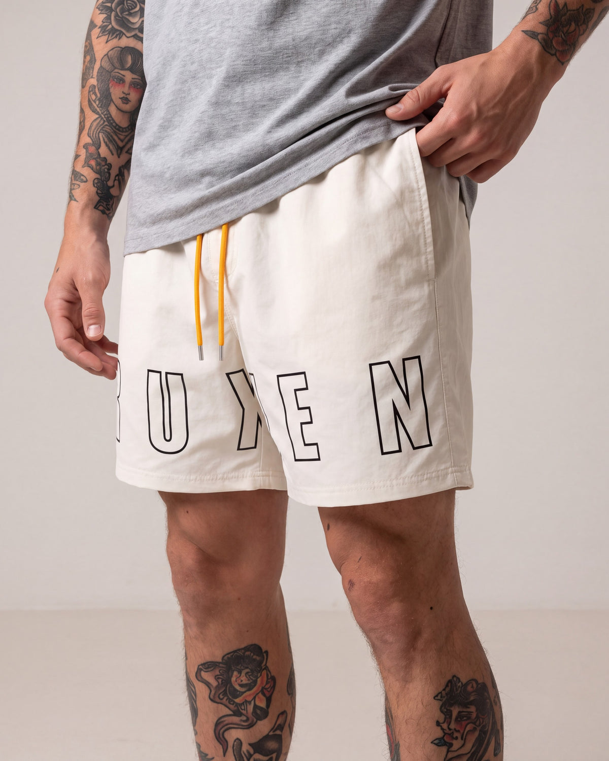 Ruxen Nylon Shorts — Off White — model detail