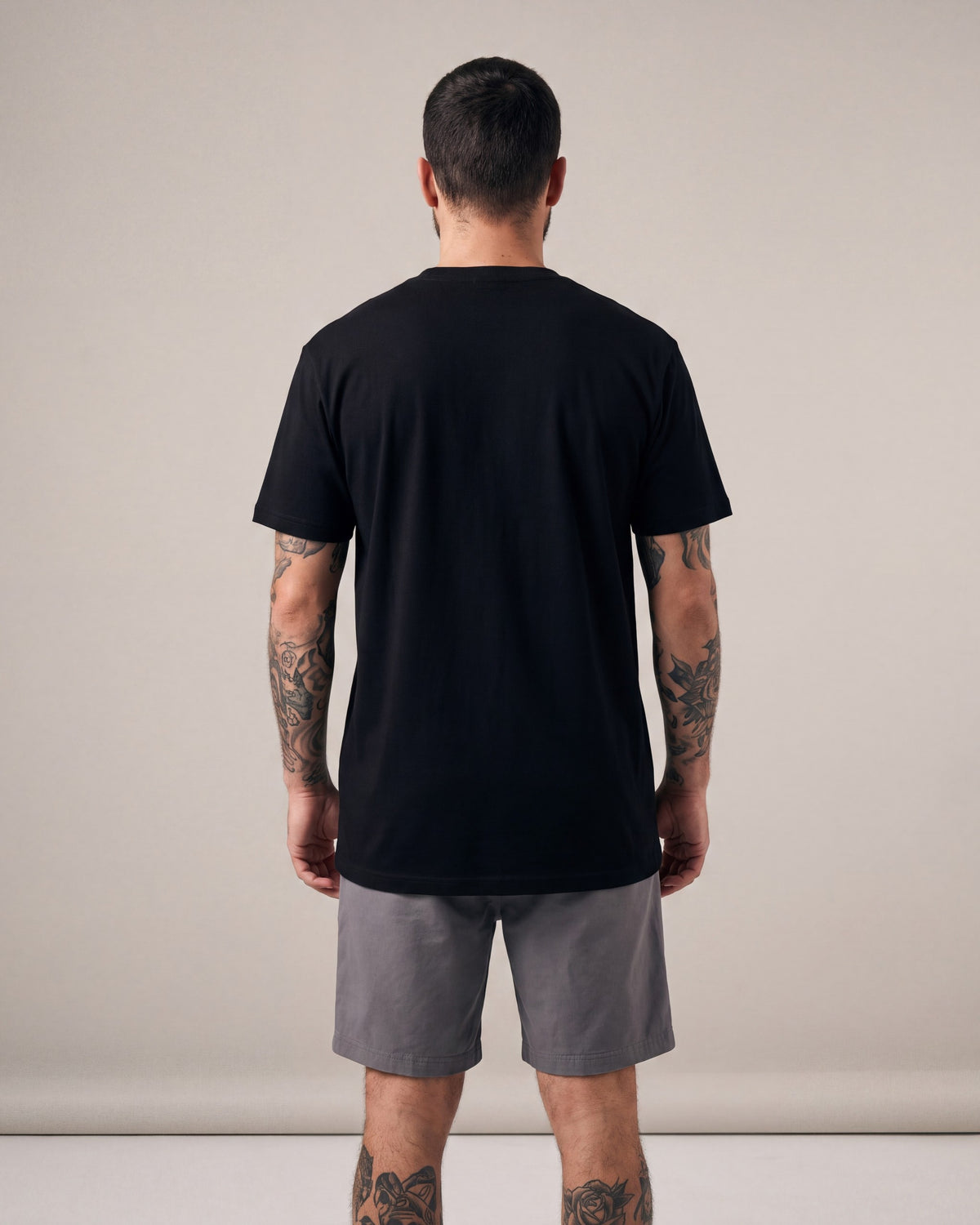 Black Scale Arch Rose SS tees — Black — model back