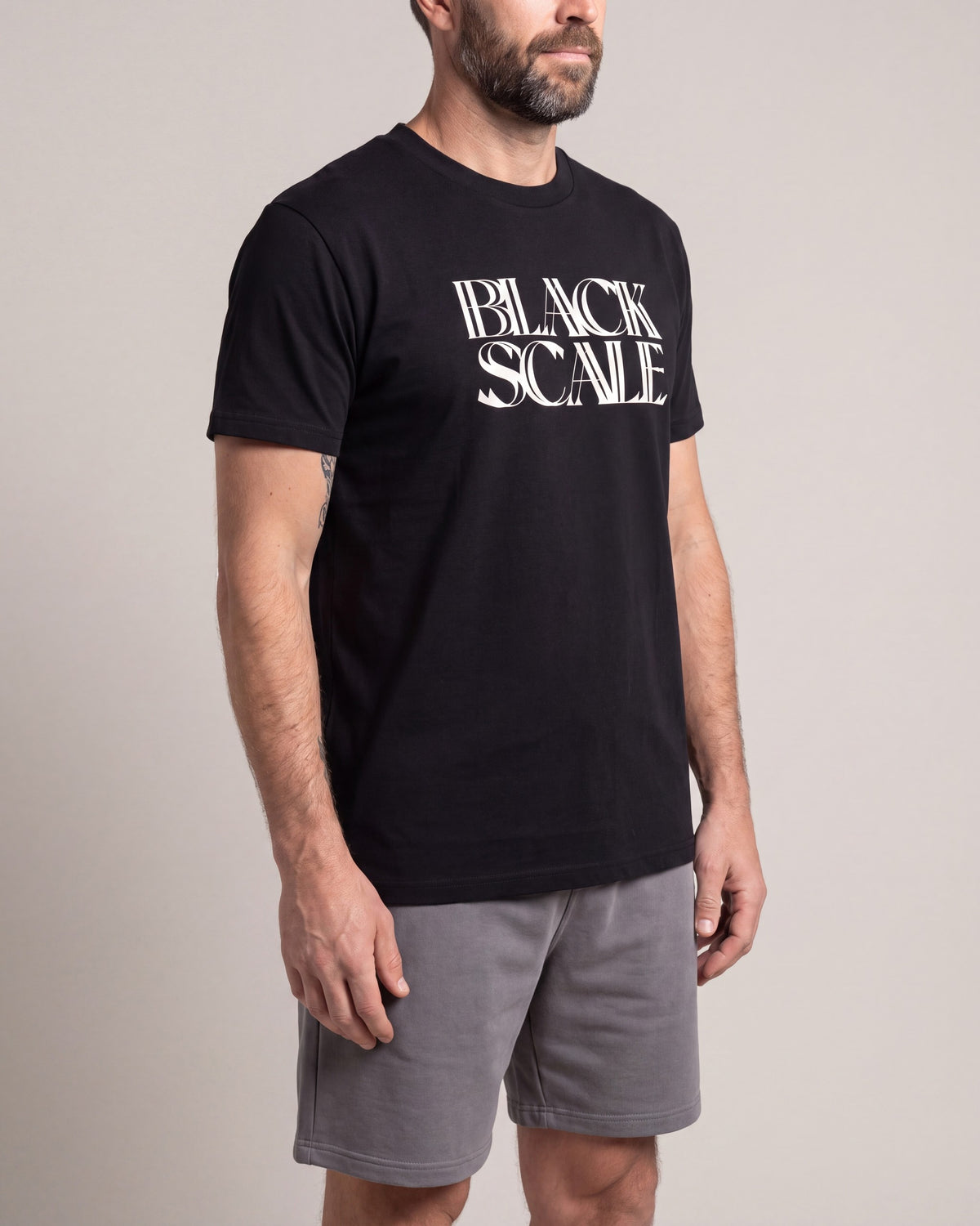 Black Scale Double Vision SS tees — Black — model side