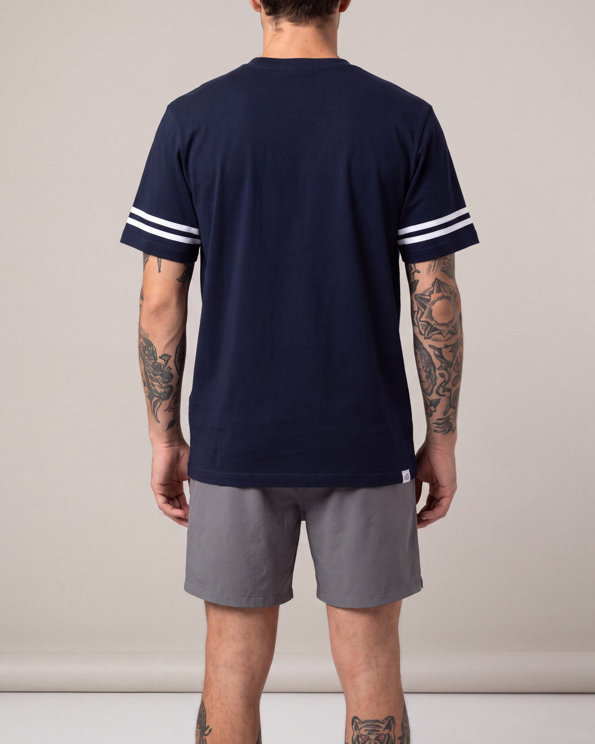 O15 NY Sleeve Stripe SS tees — Navy/White — model back