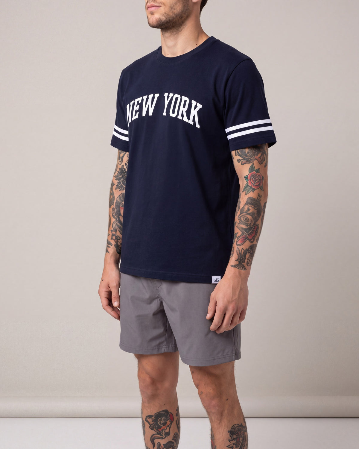 O15 NY Sleeve Stripe SS tees — Navy/White — model side