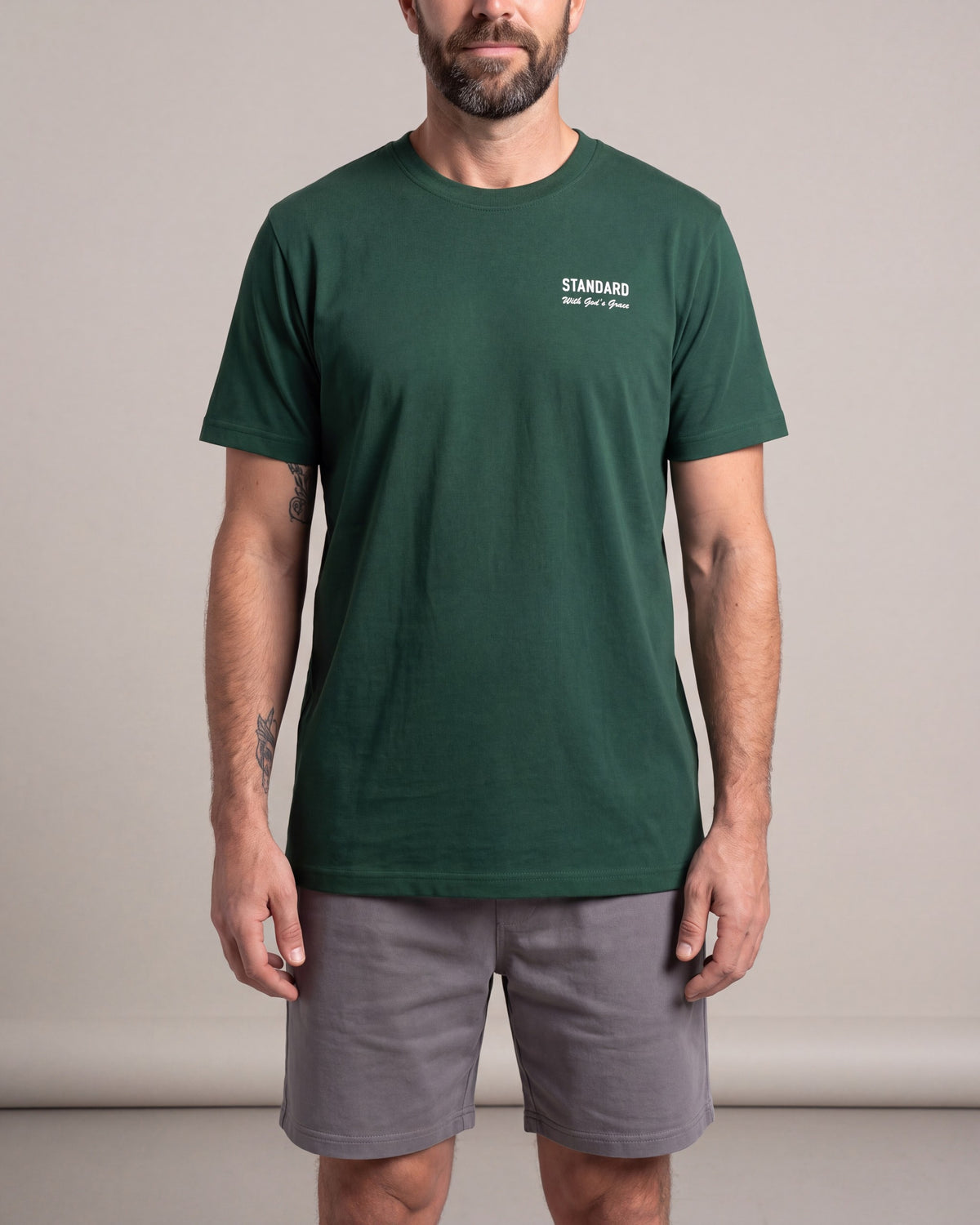 Standard Logo SS tees — Green — model front