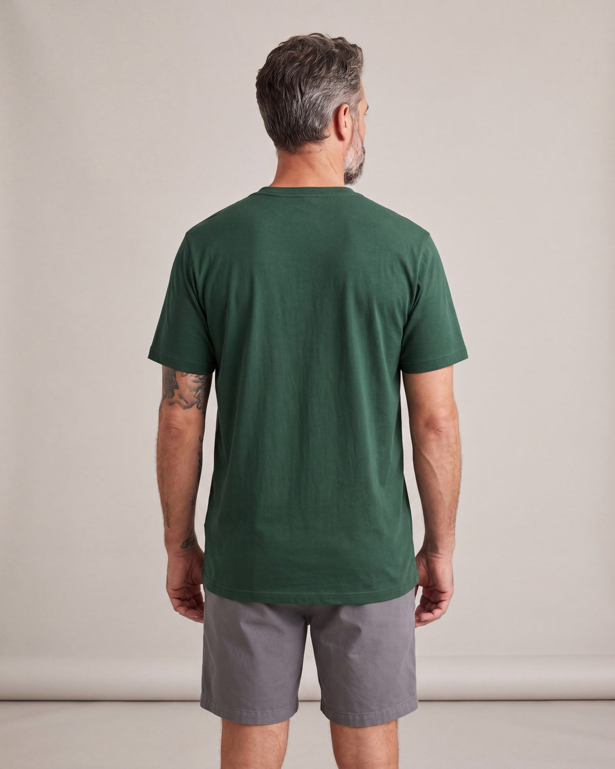Standard Logo SS tees — Green — model back