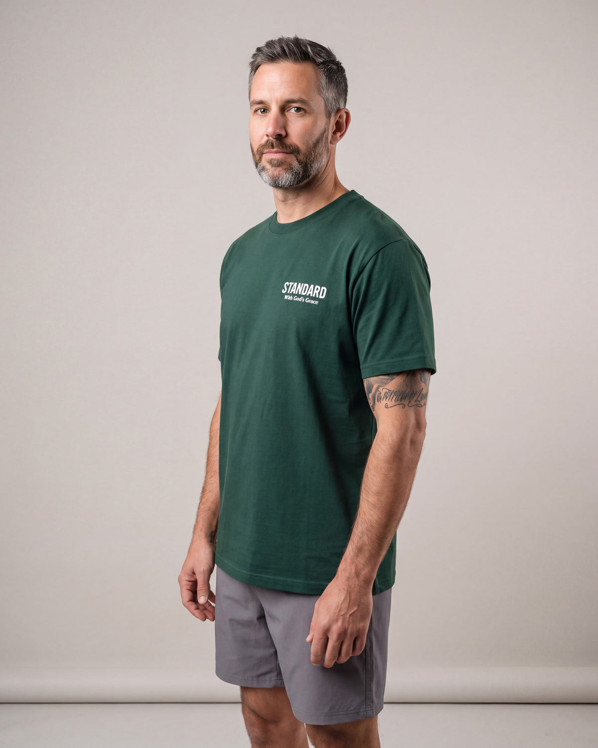 Standard Logo SS tees — Green — model side